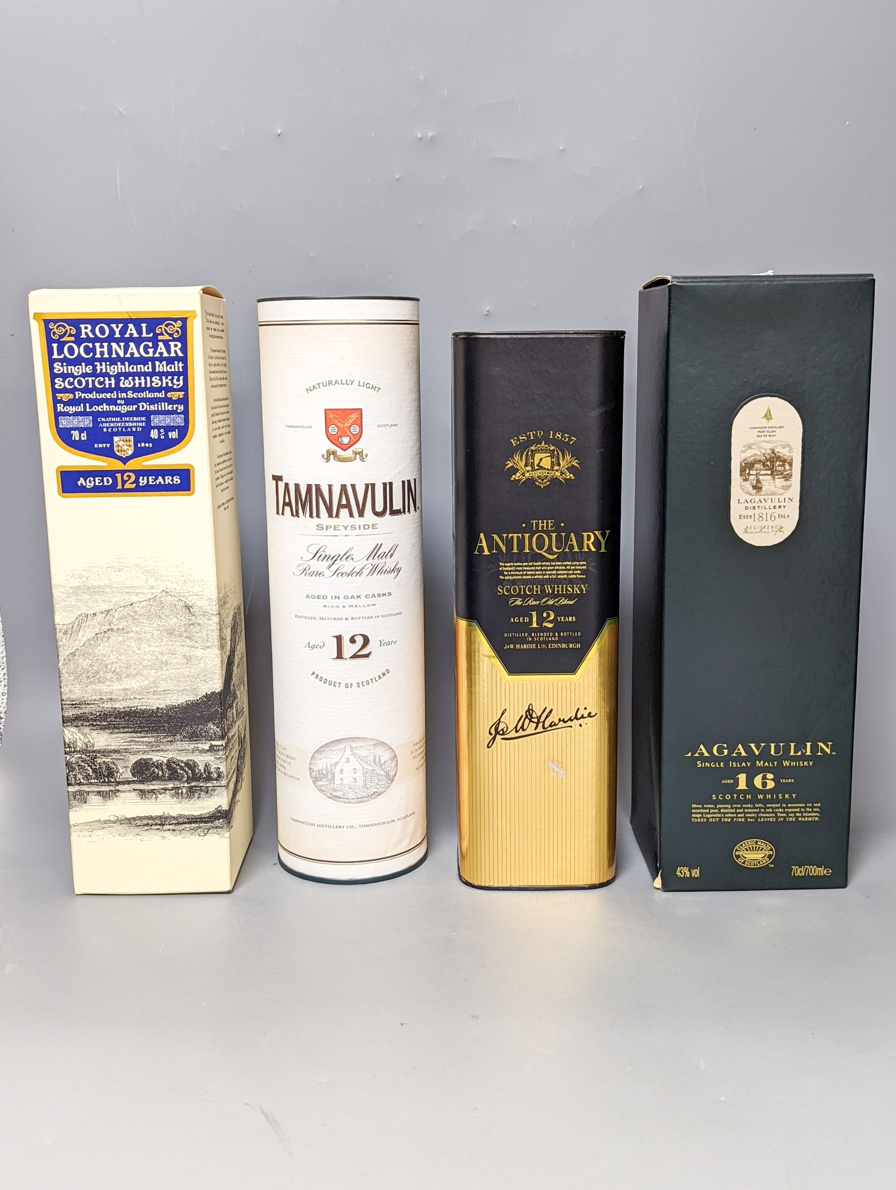 Four assorted bottles of whisky including Lagavulin 16 year old single malt, Royal Lochnagar 12 year old single malt, Tamnavulin single malt aged 12 years and The Antiquary aged 12 years, all boxed.